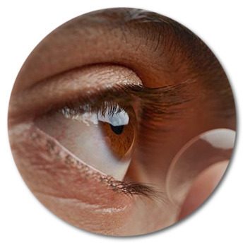 Close-up of a contact lens being fitted